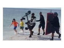 steady cam rig running with the RED filming national TV commercial on the beach in FL